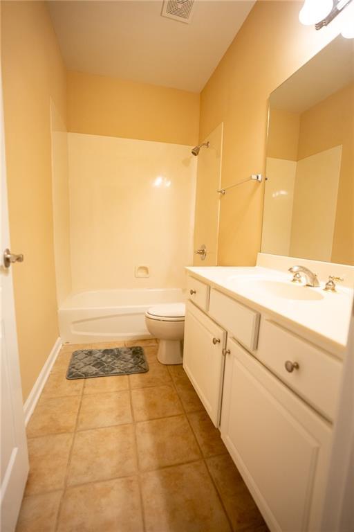 2548 Gadsen Walk, Duluth, GA 30097 - full bathroom with toilet, vanity, visible vents, and shower / bathing tub combination