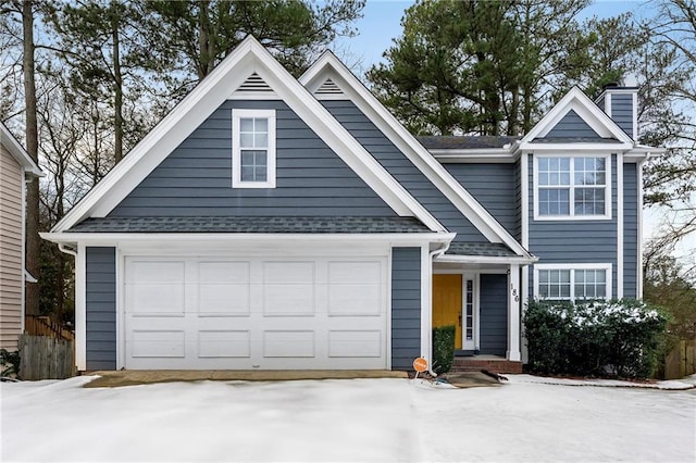 view of front of home with a garage