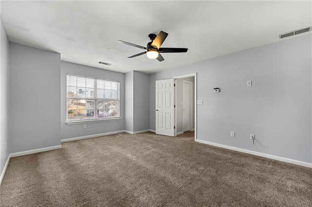 unfurnished bedroom featuring carpet floors and ceiling fan