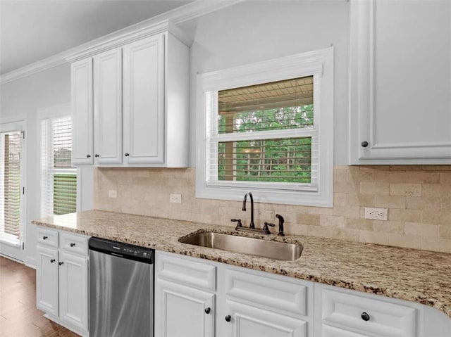 149 Elkins Blvd, Locust Grove, GA 30248 - kitchen with dishwasher, crown molding, white cabinets, tasteful backsplash, and light stone countertops