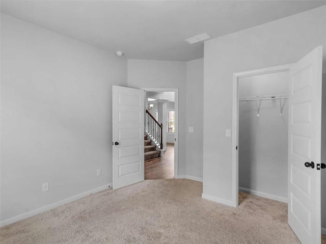 149 Elkins Blvd, Locust Grove, GA 30248 - unfurnished bedroom featuring carpet floors and a closet