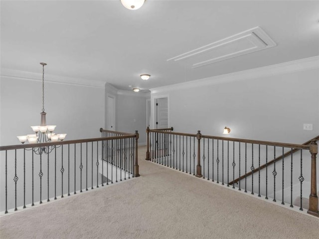 149 Elkins Blvd, Locust Grove, GA 30248 - hallway with attic access, ornamental molding, carpet floors, and a chandelier