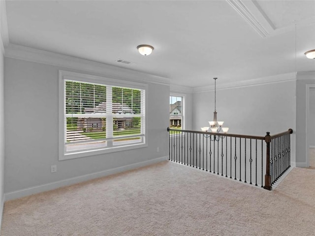 149 Elkins Blvd, Locust Grove, GA 30248 - spare room featuring crown molding, a chandelier, and carpet floors