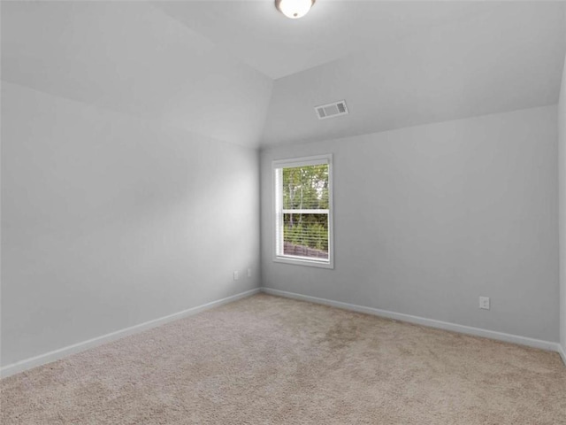 149 Elkins Blvd, Locust Grove, GA 30248 - empty room featuring carpet floors and lofted ceiling