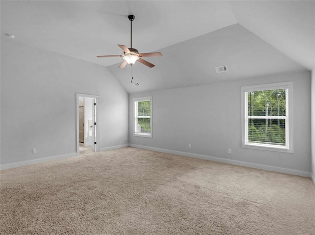 149 Elkins Blvd, Locust Grove, GA 30248 - unfurnished room featuring vaulted ceiling, ceiling fan, and light carpet