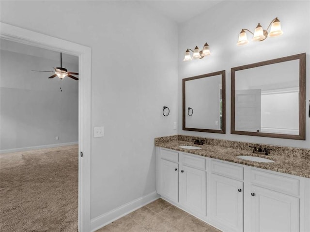 149 Elkins Blvd, Locust Grove, GA 30248 - bathroom with double vanity and a ceiling fan
