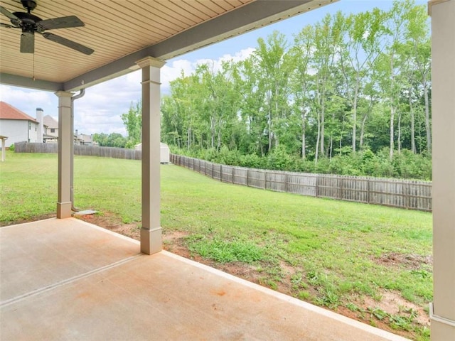 149 Elkins Blvd, Locust Grove, GA 30248 - fenced backyard featuring a patio area and ceiling fan