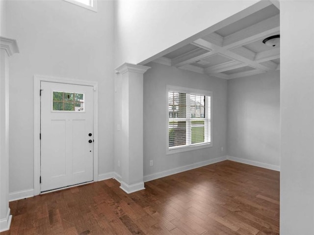 149 Elkins Blvd, Locust Grove, GA 30248 - foyer featuring wood finished floors, coffered ceiling, beam ceiling, and decorative columns