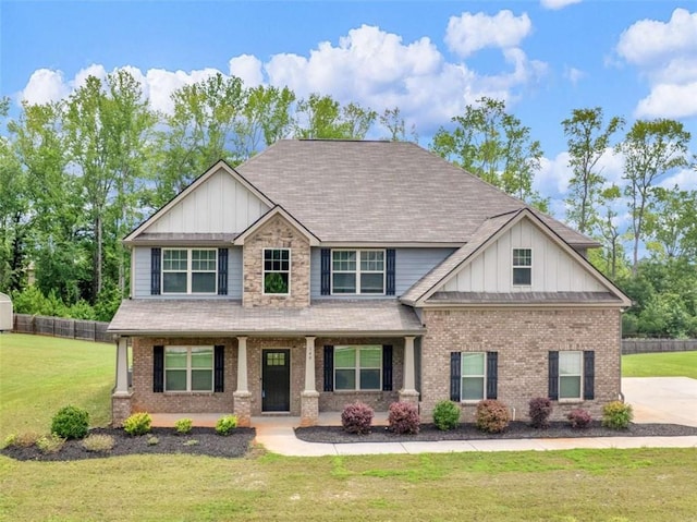149 Elkins Blvd, Locust Grove, GA 30248 - craftsman inspired home with board and batten siding, brick siding, and a shingled roof