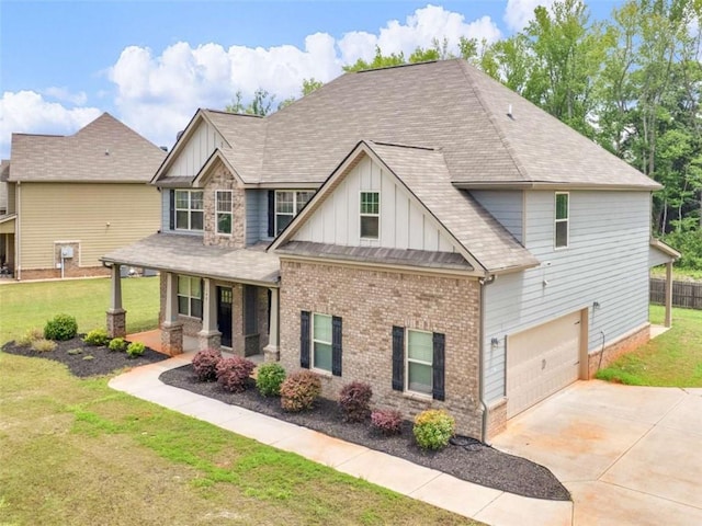 149 Elkins Blvd, Locust Grove, GA 30248 - craftsman inspired home with board and batten siding, a front yard, a garage, and covered porch