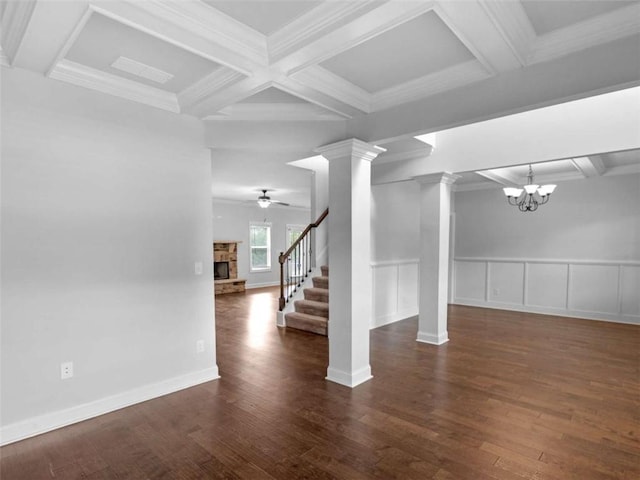 149 Elkins Blvd, Locust Grove, GA 30248 - below grade area featuring hardwood / wood-style floors, a ceiling fan, a fireplace, a decorative wall, and ornamental molding