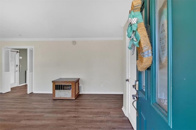 entryway featuring crown molding and dark hardwood / wood-style floors