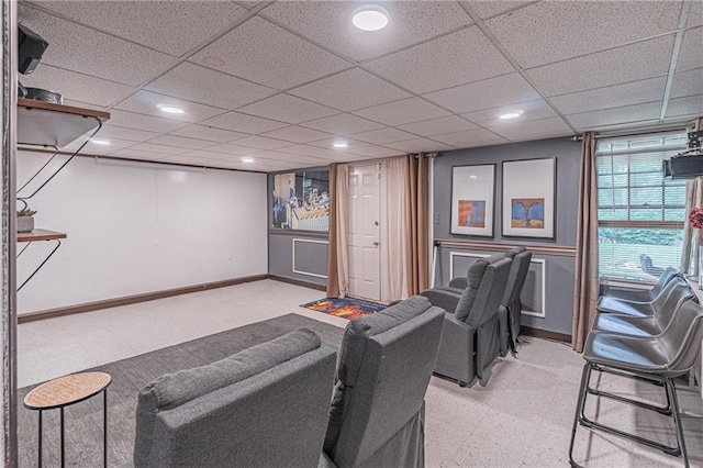 home theater featuring a paneled ceiling