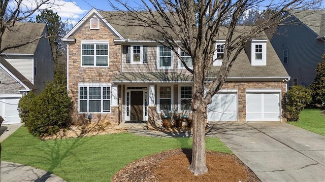 view of front facade with a garage, concrete driveway, stone siding, and a front lawn