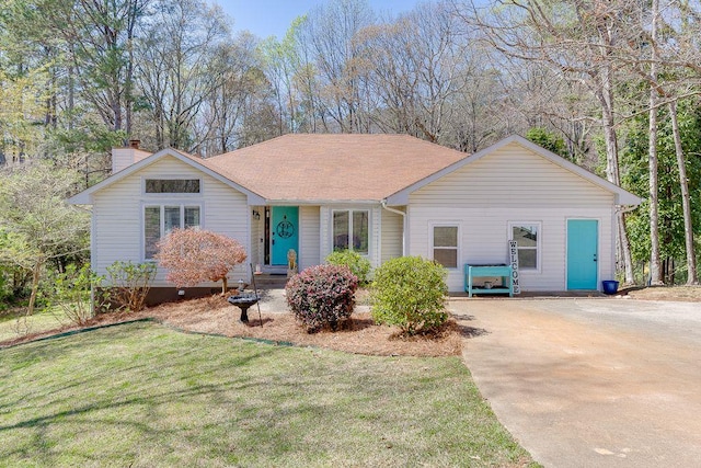 4434 Hidden Oaks Dr, Flowery Branch, GA 30542 - single story home featuring a chimney, a front lawn, and concrete driveway
