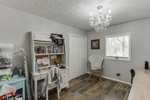 4434 Hidden Oaks Dr, Flowery Branch, GA 30542 - office area featuring a chandelier, a textured ceiling, and dark wood-style flooring