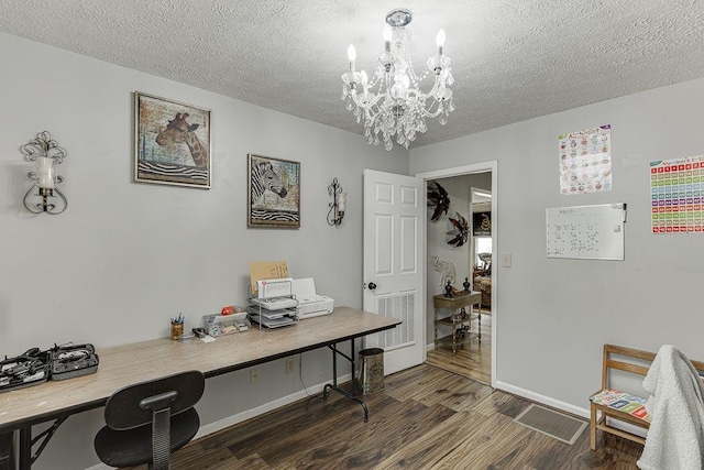 4434 Hidden Oaks Dr, Flowery Branch, GA 30542 - office space with dark wood finished floors, a textured ceiling, and a chandelier