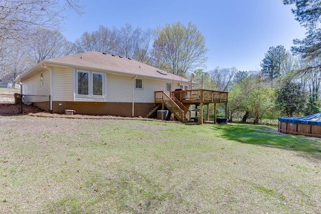 4434 Hidden Oaks Dr, Flowery Branch, GA 30542 - back of property featuring stairs and a deck