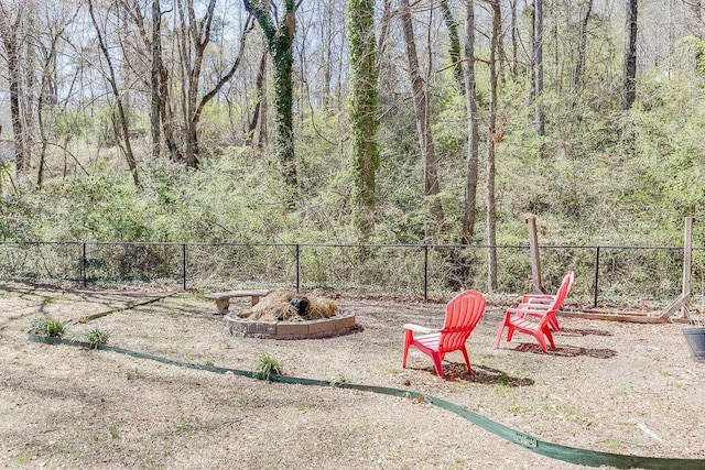 4434 Hidden Oaks Dr, Flowery Branch, GA 30542 - view of yard with an outdoor fire pit