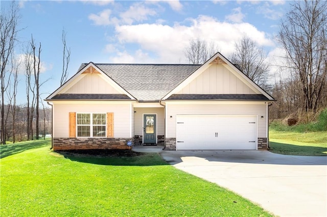 craftsman-style home featuring a garage and a front lawn