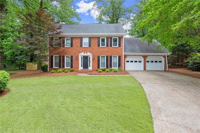 4504 Reva Way NE, Marietta, GA 30066 - colonial inspired home featuring an attached garage, concrete driveway, a front lawn, and brick siding