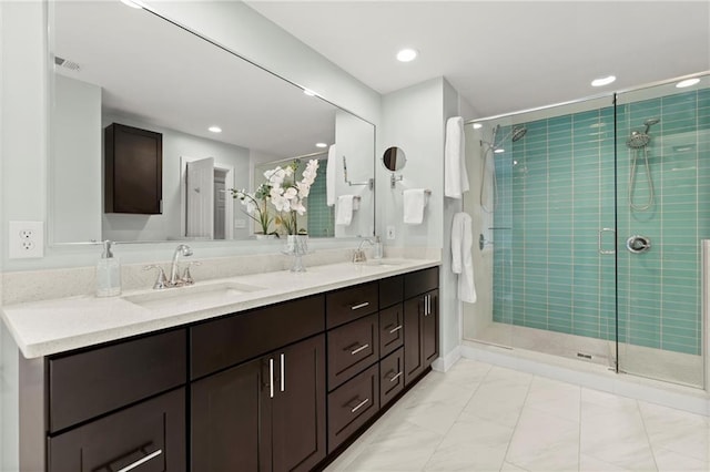 4504 Reva Way NE, Marietta, GA 30066 - full bath featuring double vanity, a shower stall, marble look tiles, and recessed lighting