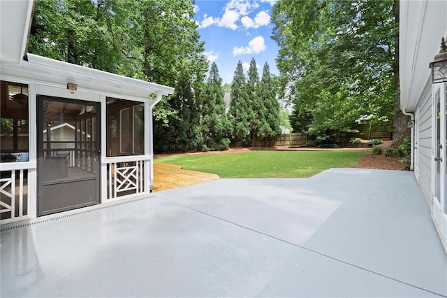 4504 Reva Way NE, Marietta, GA 30066 - view of patio featuring a sunroom and view of scattered trees