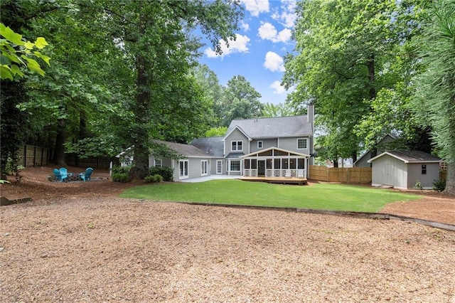 4504 Reva Way NE, Marietta, GA 30066 - rear view of property featuring a sunroom, a chimney, and a patio