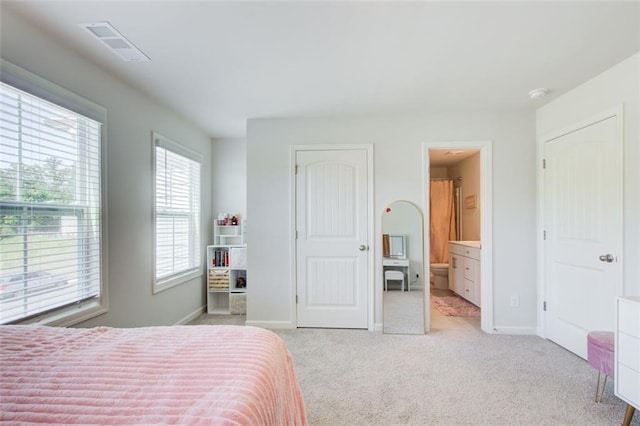 42 Citrine Way, Acworth, GA 30101 - bedroom with light carpet, baseboards, and ensuite bathroom