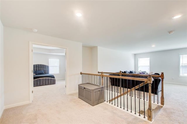 42 Citrine Way, Acworth, GA 30101 - hallway with an upstairs landing, light colored carpet, baseboards, and recessed lighting