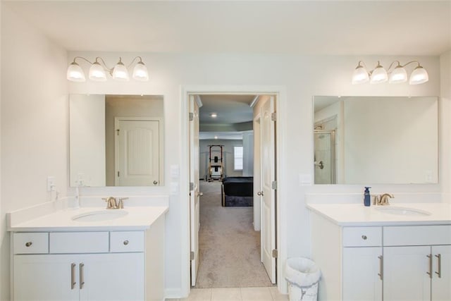 42 Citrine Way, Acworth, GA 30101 - full bathroom featuring two vanities, a shower stall, and tile patterned floors