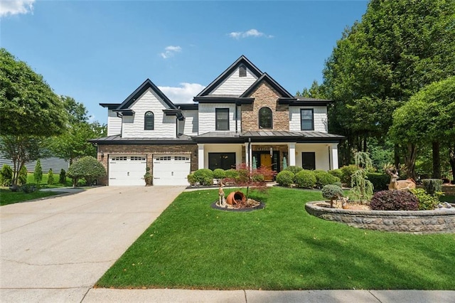 craftsman inspired home featuring a front yard, a porch, and a garage