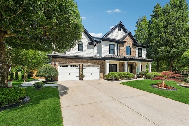 craftsman-style home featuring a front lawn and a garage