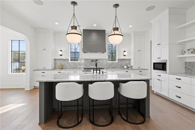 56 Pine St, Roswell, GA 30075 - kitchen featuring open shelves, built in microwave, decorative backsplash, white cabinets, and recessed lighting