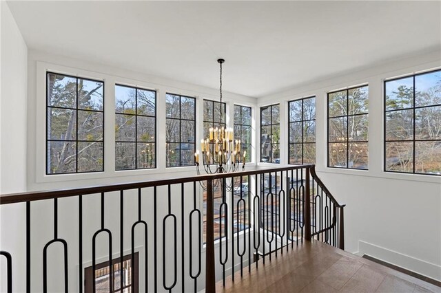 56 Pine St, Roswell, GA 30075 - hall featuring recessed lighting, light wood-type flooring, a barn door, and attic access