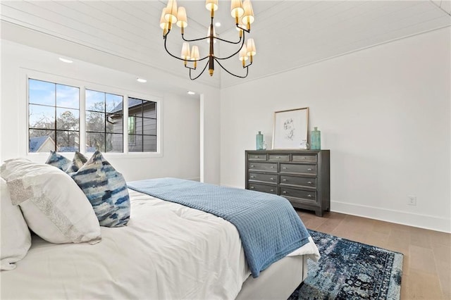 56 Pine St, Roswell, GA 30075 - bedroom featuring a chandelier, wood finished floors, and baseboards