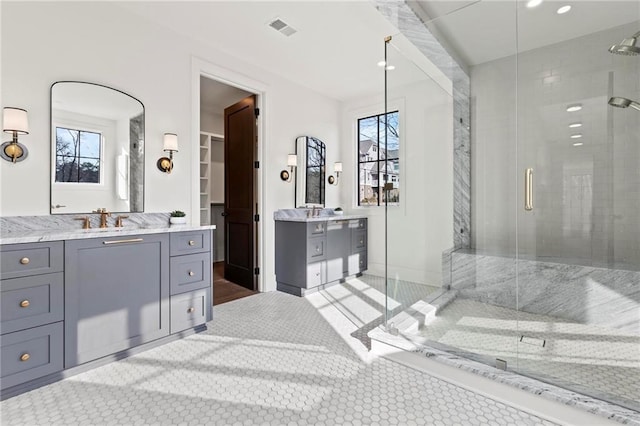 56 Pine St, Roswell, GA 30075 - bathroom featuring a stall shower and two vanities