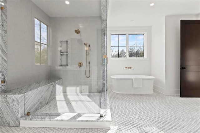 56 Pine St, Roswell, GA 30075 - bathroom with a freestanding tub, a tile shower, recessed lighting, and baseboards