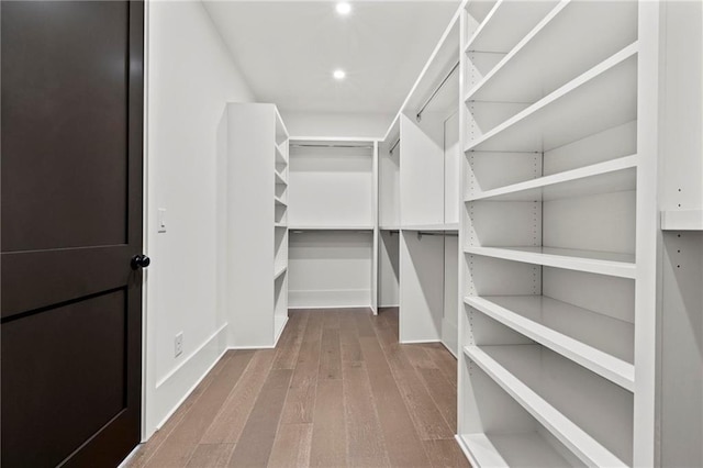 56 Pine St, Roswell, GA 30075 - walk in closet with hardwood / wood-style flooring