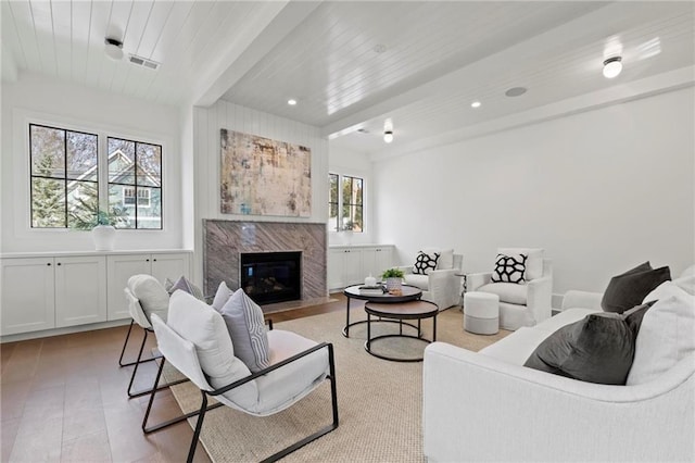 56 Pine St, Roswell, GA 30075 - living room featuring a high end fireplace, beamed ceiling, recessed lighting, and wooden ceiling