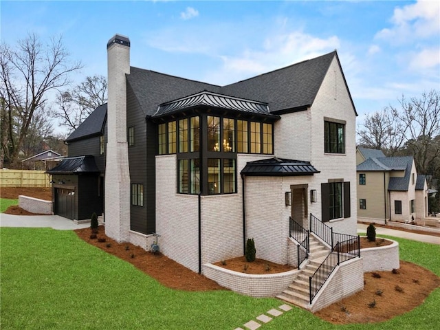 56 Pine St, Roswell, GA 30075 - rear view of house featuring brick siding, a yard, a chimney, and roof with shingles