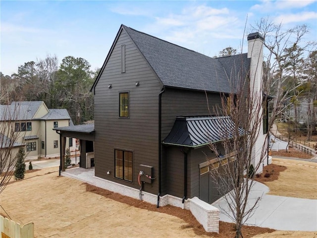 56 Pine St, Roswell, GA 30075 - back of house with a chimney, a patio, and roof with shingles