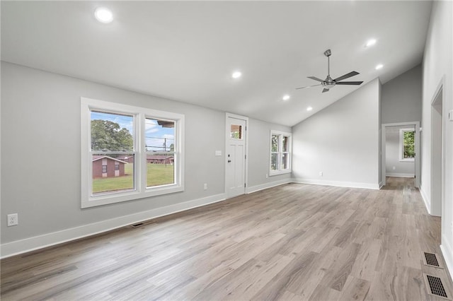 unfurnished living room featuring recessed lighting, a ceiling fan, light wood-style floors, and plenty of natural light