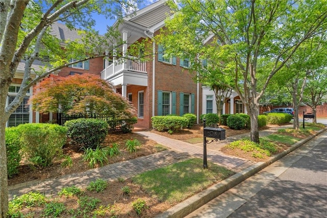 8730 Parker Pl, Roswell, GA 30076 - view of front facade with brick siding and a balcony