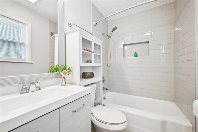 1118 Creekdale Dr, Clarkston, GA 30021 - bathroom featuring bathing tub / shower combination, toilet, and vanity