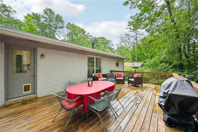 1118 Creekdale Dr, Clarkston, GA 30021 - wooden deck with outdoor dining area, grilling area, and outdoor lounge area