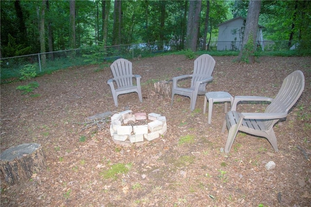 1118 Creekdale Dr, Clarkston, GA 30021 - fenced backyard featuring a fire pit