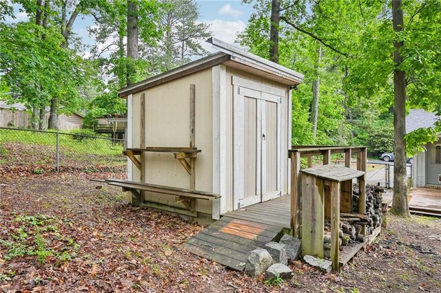 1118 Creekdale Dr, Clarkston, GA 30021 - view of shed featuring fence