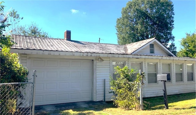 exterior space with a garage