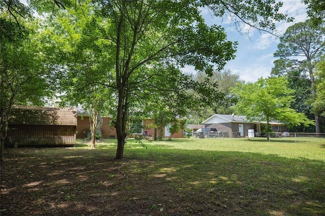 view of yard with fence